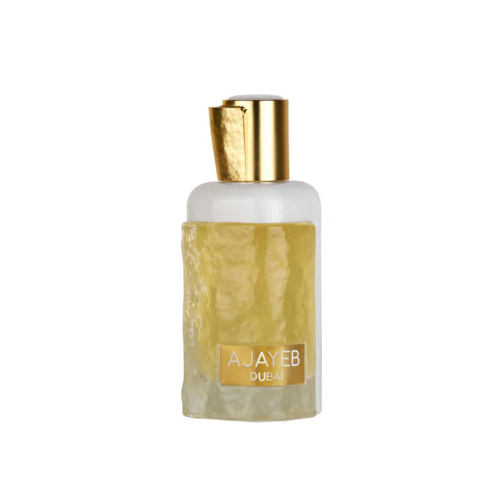 Perfume bottle with gold cap and label on a white background