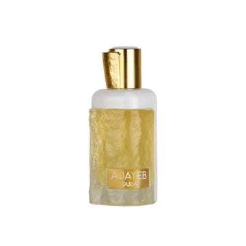 Perfume bottle with gold cap and label on a white background