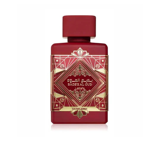 Red and gold perfume bottle with intricate design on a white background