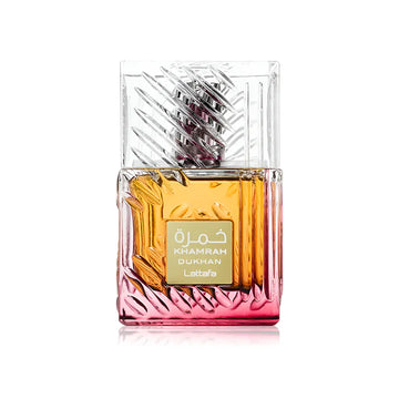 Perfume bottle with intricate design and visible brand name on a white background
