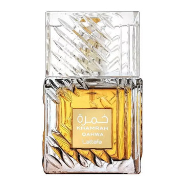 Perfume bottle with gold liquid and 'Khamrah Qahwa' label on a white background