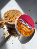 Close-up of the scrub’s texture on a wooden spoon, showcasing its rich, creamy consistency.
