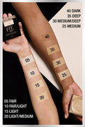 “Flatlay of multiple Fit Me Loose Powder shades to suit different skin tones”

