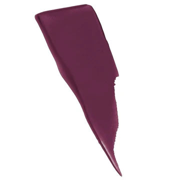 Maybelline SuperStay Matte Ink lipstick with applicator shown and open tube lying flat


