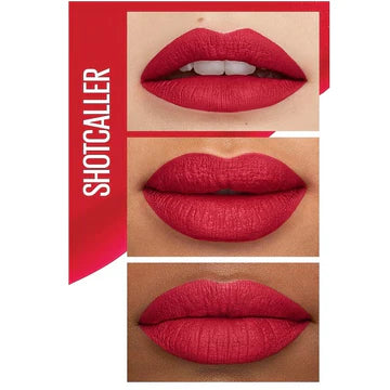 Model wearing vibrant pink SuperStay Matte Ink™ Lipstick, smiling confidently

