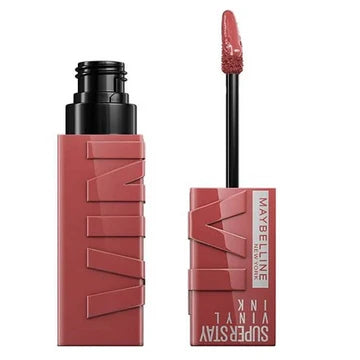 Model wearing glossy nude Vinyl Ink lipstick with radiant finish

