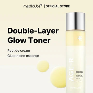 Skincare bottle with a white cap and yellow sphere on a white background