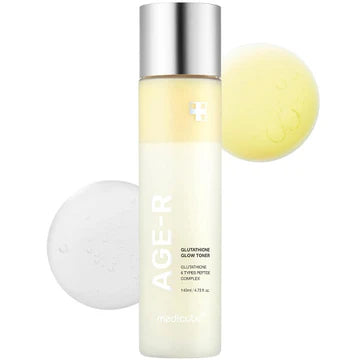 Skincare bottle with a white cap and yellow sphere on a white background