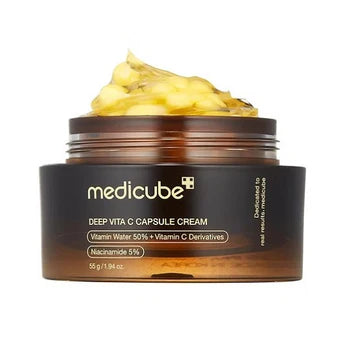 Medicube Deep Vita C Capsule Cream jar with cream on top on a white background