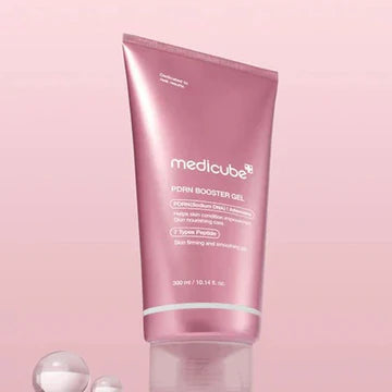 Pink tube of Medicube product on a pink background