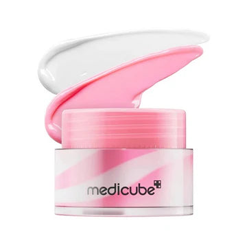 Pink and white jar of Medicube cream with pink cream swirled out on a white background