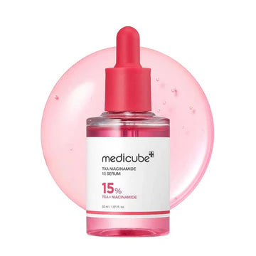Medicube serum bottle with pink dropper on a white background