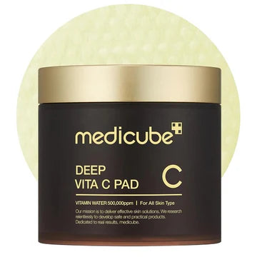 Medicube Deep Vita C Pad with a gold lid on a white background