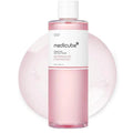 Pink bottle with white label on a white background