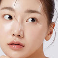 Close-up of a person's face with a focus on the skin texture.