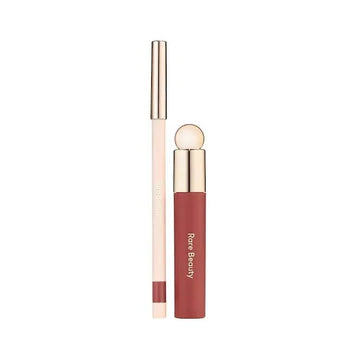 Flat-lay of both lip oil and matte lip liner arranged aesthetically on a neutral background.

