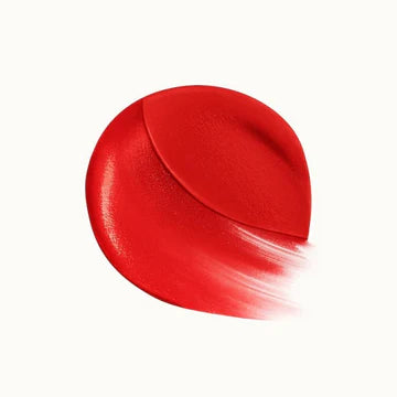 Product texture showing the whipped, velvety formula on a makeup applicator.

