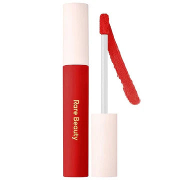 Product texture showing the whipped, velvety formula on a makeup applicator.

