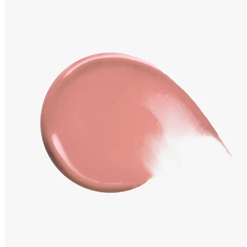 Close-up of dewy and matte liquid blush tubes lined up in a flat lay
