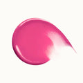 Close-up of the blush applicator showing creamy, weightless texture.

