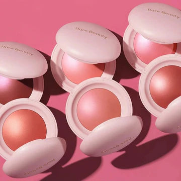 Compact powder blush with radiant pink tones in elegant packaging


