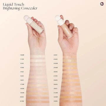 Close-up of liquid concealer applied under the eye, brightening and smoothing the area.


