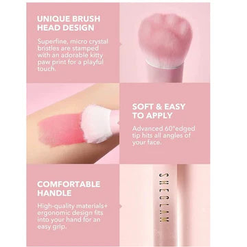 Sheglam Color Bloom Liquid Blush Brush with a unique brush head design, featuring a cat paw print and a 60° angled tip for precise application. The handle is ergonomic with a soft grip, described as ‘Superface’ for effortless blending