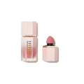 SHEGLAM Color Bloom Dayglow Liquid Blush in the shade 'Love Cake,' featuring a sleek tube packaging with a doe-foot applicator. The label includes contact information (TEL: 1234567890) for customer support