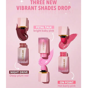Close-up of SHEGLAM Color Bloom Dayglow Liquid Blush in 'Night Drive' showing its sleek, matte black tube with bold white typography reading 'GET BOLD WITH OG MATTE SHADES!' The compact packaging features a precision doe-foot applicator and silver accent details, emphasizing its professional yet playful vibe