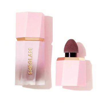 Close-up of SHEGLAM Color Bloom Dayglow Liquid Blush in 'Night Drive' showing its sleek, matte black tube with bold white typography reading 'GET BOLD WITH OG MATTE SHADES!' The compact packaging features a precision doe-foot applicator and silver accent details, emphasizing its professional yet playful vibe
