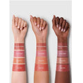 Three arms with different skin tones showcasing swatches of SHEGLAM Color Bloom Dayglow Liquid Blush in four shades: Risky Business, Love Cake, Float On, and Devoted