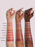 Shows swatches of Sheglam Liquid Blush on three different skin tones.