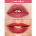 Close-up of SHEGLAM For the Flush Lip & Cheek Tint in 'Fruit Punch' shade applied on lips, showing a vibrant, glossy stain with a natural gradient effect. The tint provides a juicy, berry-toned finish with a dewy sheen, enhancing lip fullness while maintaining a lightweight feel
