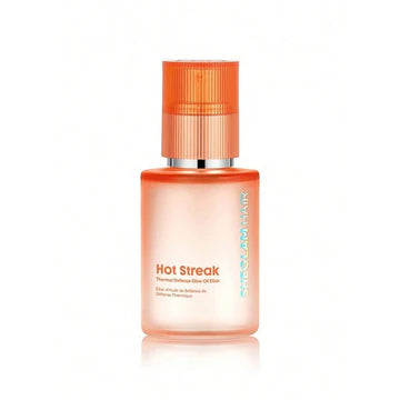 SHEGLAM Hot Streak Thermal Defense Glow Oil Elixir in a 50ML amber glass bottle with gold-toned pump. Packaging features bold claims like 'MORE SHINE 90%*' and visual contrast of 'BEFORE/AFTER' hair (dull vs. smooth/shiny). The minimalist design highlights its heat-protectant and shine-enhancing benefits for all hair types