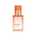 SHEGLAM Hot Streak Thermal Defense Glow Oil Elixir in a 50ML amber glass bottle with gold-toned pump. Packaging features bold claims like 'MORE SHINE 90%*' and visual contrast of 'BEFORE/AFTER' hair (dull vs. smooth/shiny). The minimalist design highlights its heat-protectant and shine-enhancing benefits for all hair types