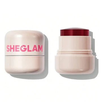 closed and an opened Sheglam Jelly-Licious Hydrating Lip & Blush Tint in the shade "Cheerio" are shown against a white background. The closed container has "SHEGLAM" printed on it. The opened container reveals the dark reddish-pink jelly tint.