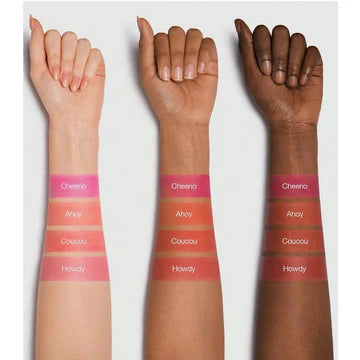 closed and an opened Sheglam Jelly-Licious Hydrating Lip & Blush Tint in the shade "Cheerio" are shown against a white background. The closed container has "SHEGLAM" printed on it. The opened container reveals the dark reddish-pink jelly tint.