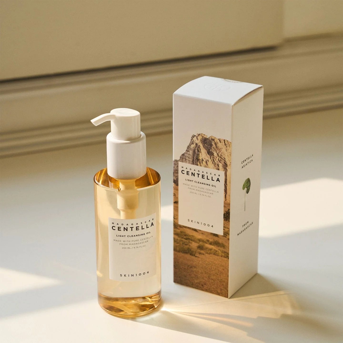Skincare bottle and packaging with 'Skin104' branding on a neutral background
