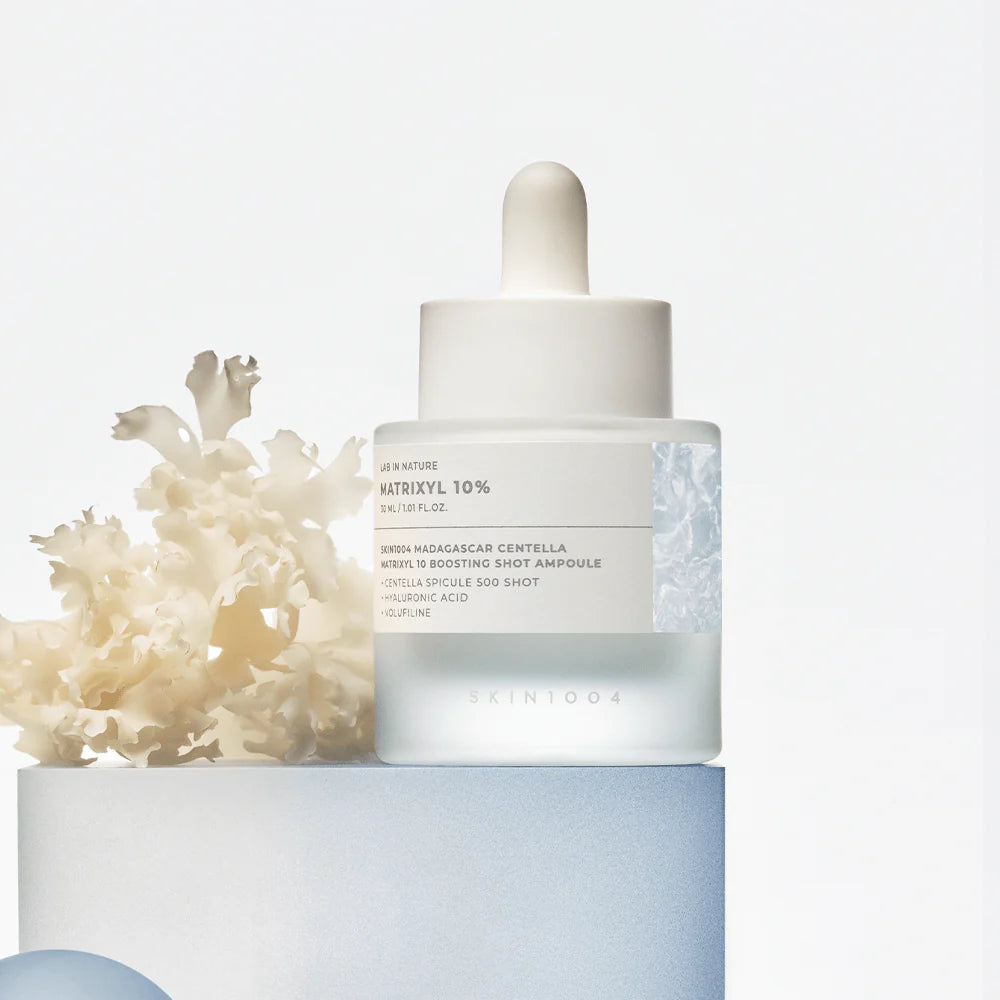 Skintouch skincare ampoule bottle with dropper on a white background