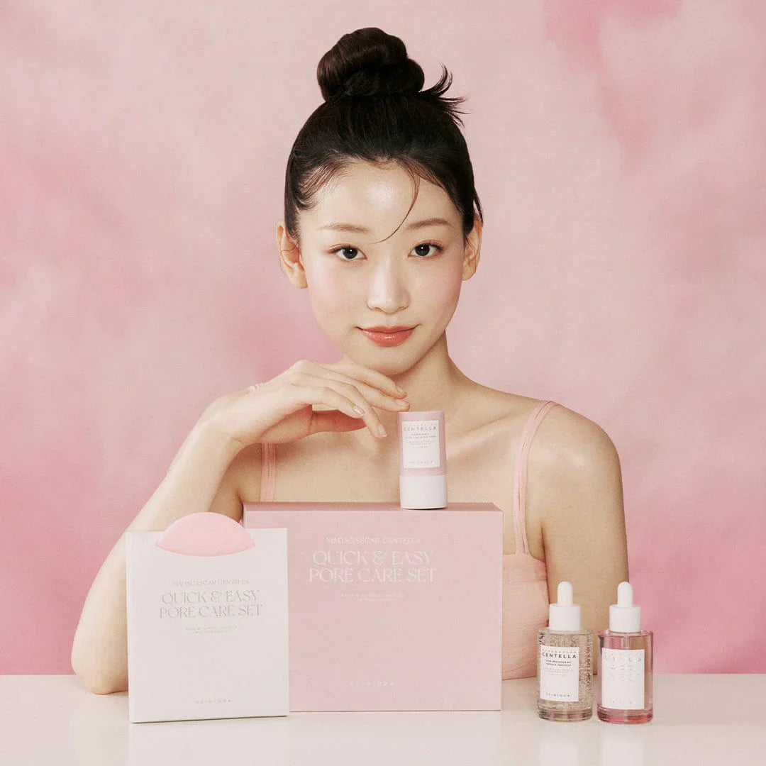 Woman with skincare products on a pink background