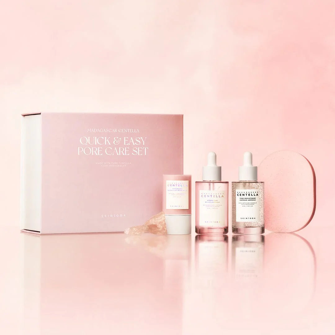 Gift set with a pink box and purple floral design on a white background
