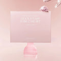 Pink skincare product with packaging labeled 'Quick & Easy Pore Care Set' on a pink background