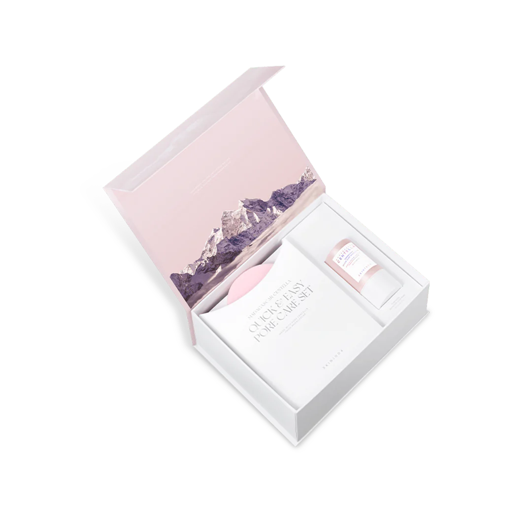 Gift set with a pink box and purple floral design on a white background