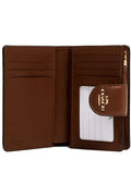 Buy Coach C0082 Medium Corner Zip Wallet In Signature Canvas in Pakistan