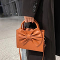 Branded brown women’s handbag